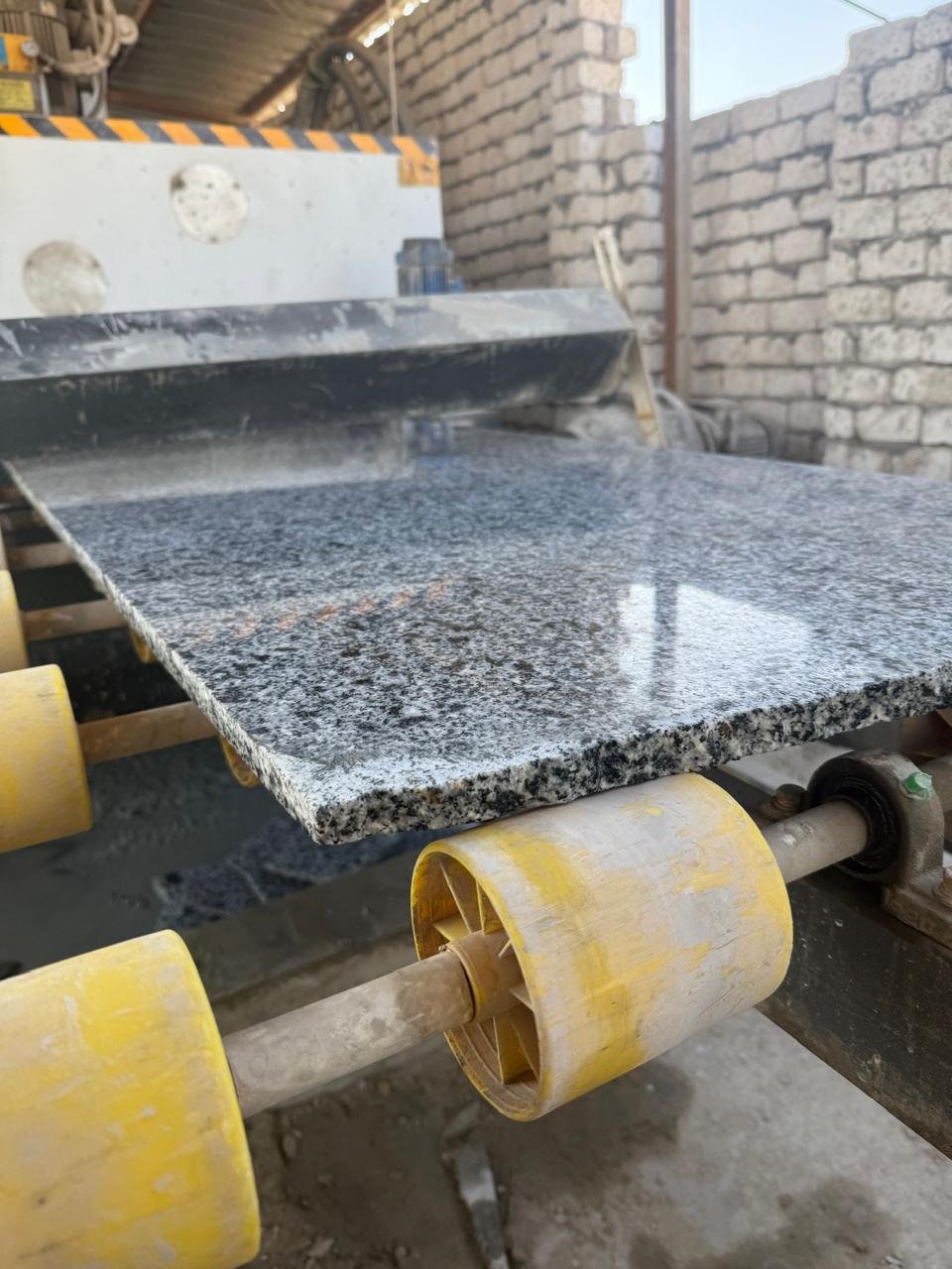 Egyptian granite tile being polished in our factory